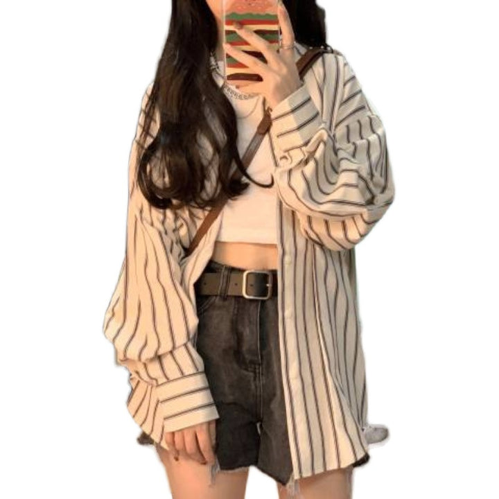 Dame stripete overskjorte bluse i en avslappet fasong med oversized ermer