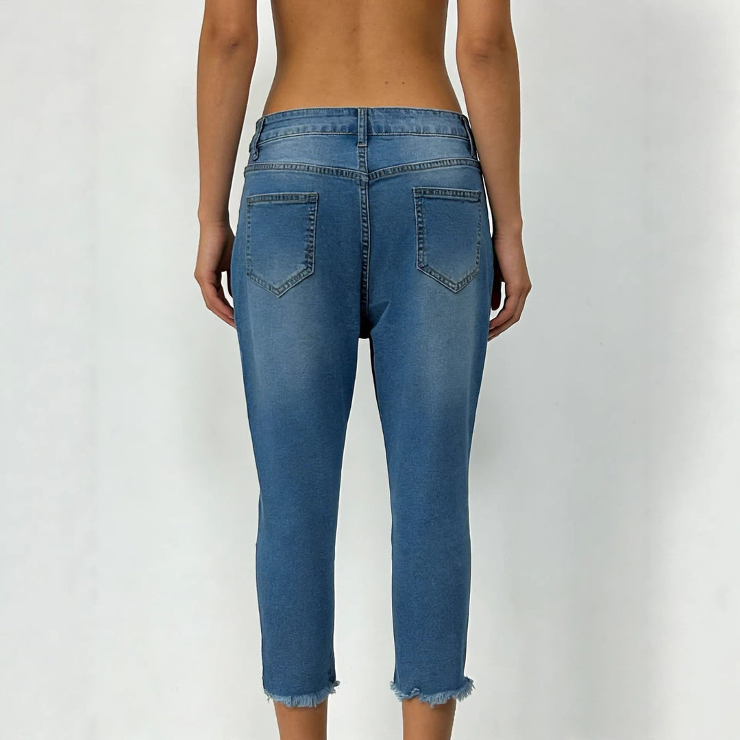 Dame casual high-waist jeans med frynset kant og trendy snitt Skjora