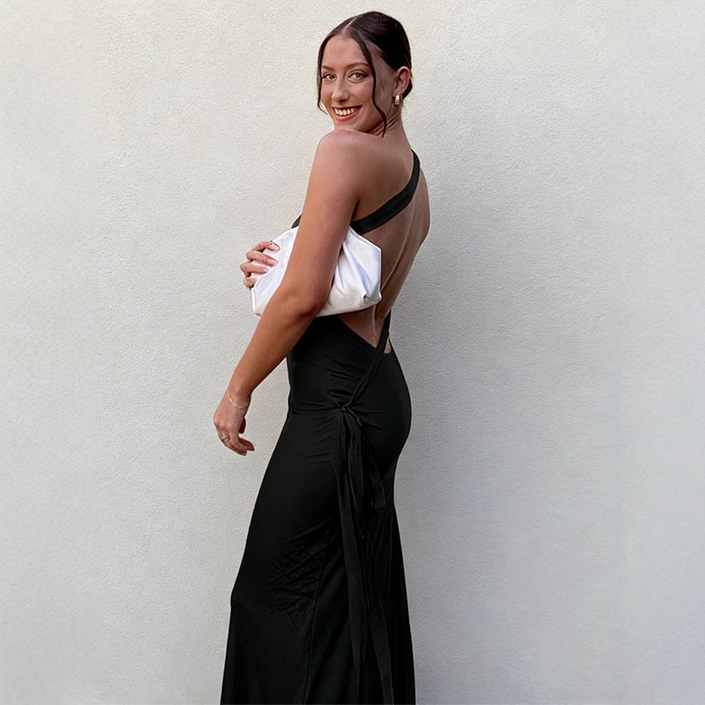 Dame elegant maxi kjole med asymmetrisk halterdesign og skimrende sateng Skjora