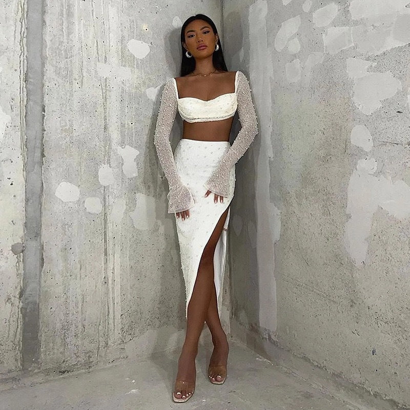Dame Elegant Crop-Topp med lange, transparente ermer og glitrende akenter Skjora