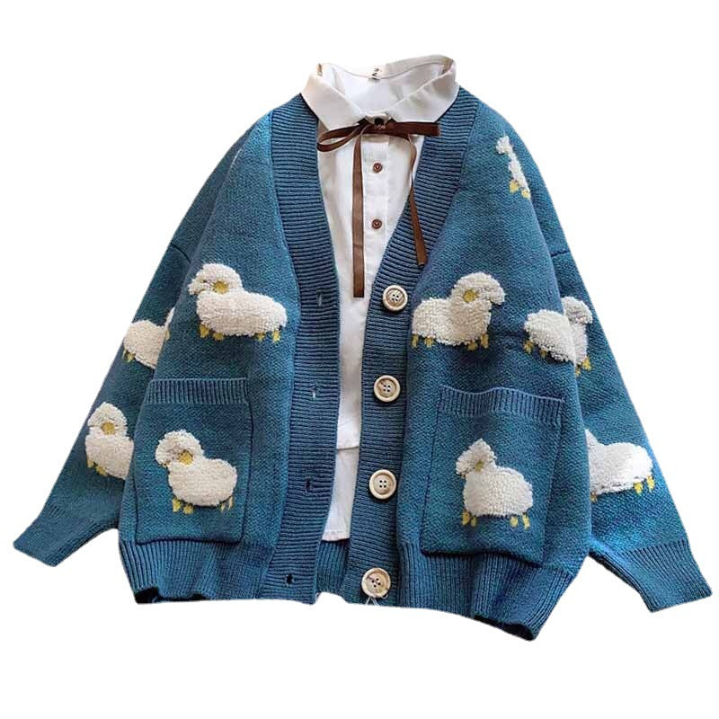 Dame cardigan med lekent sauemotiv og store knapper Skjora