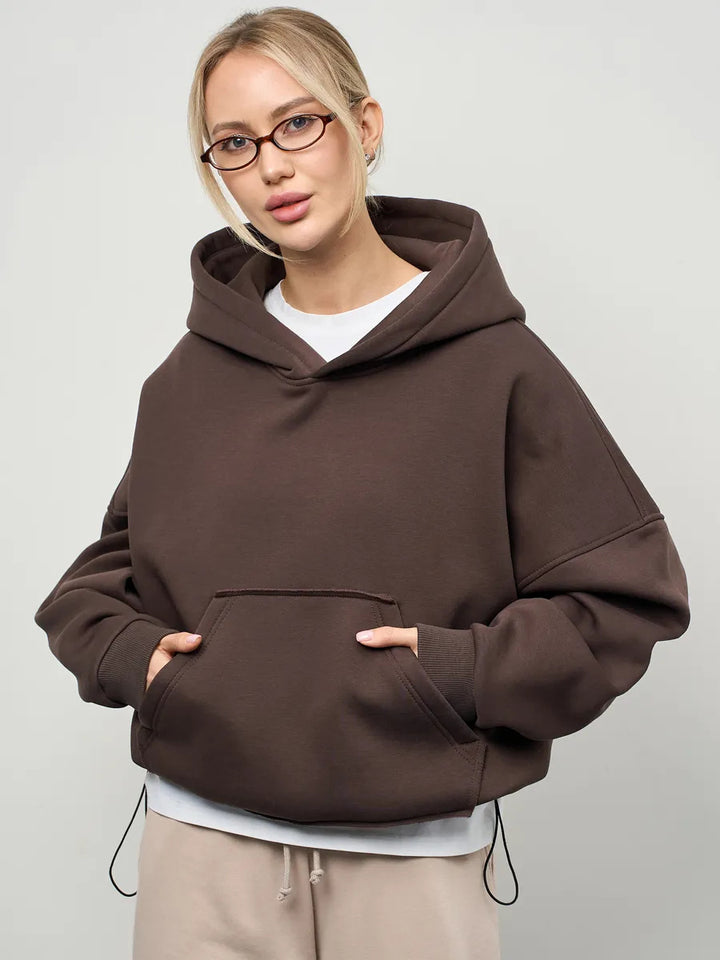 Dame oversized hettegenser med sidelommer og avslappet passform Skjora