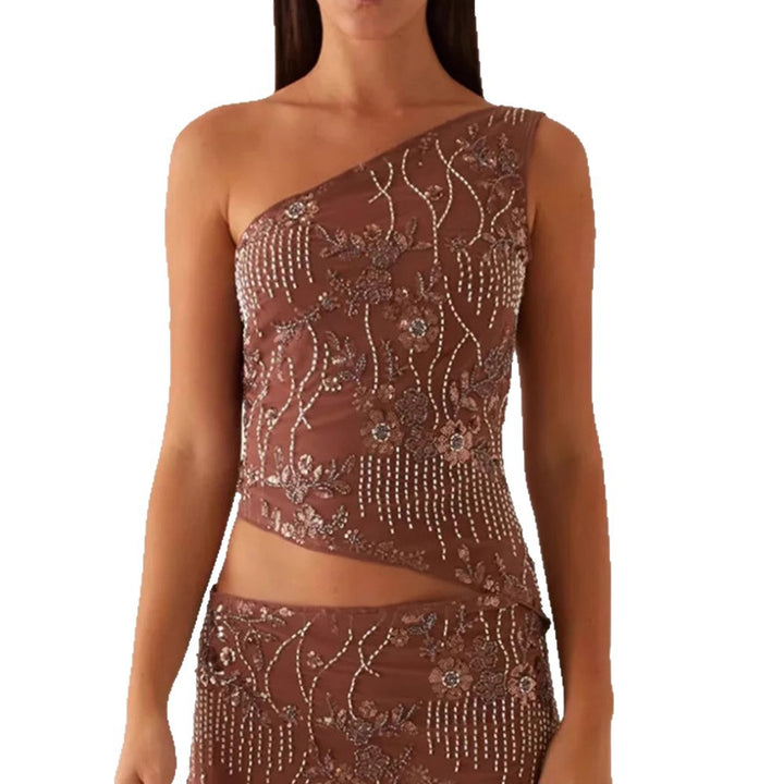 Kvinnes asymmetrisk topp med blomstret rhinestone-design Skjora