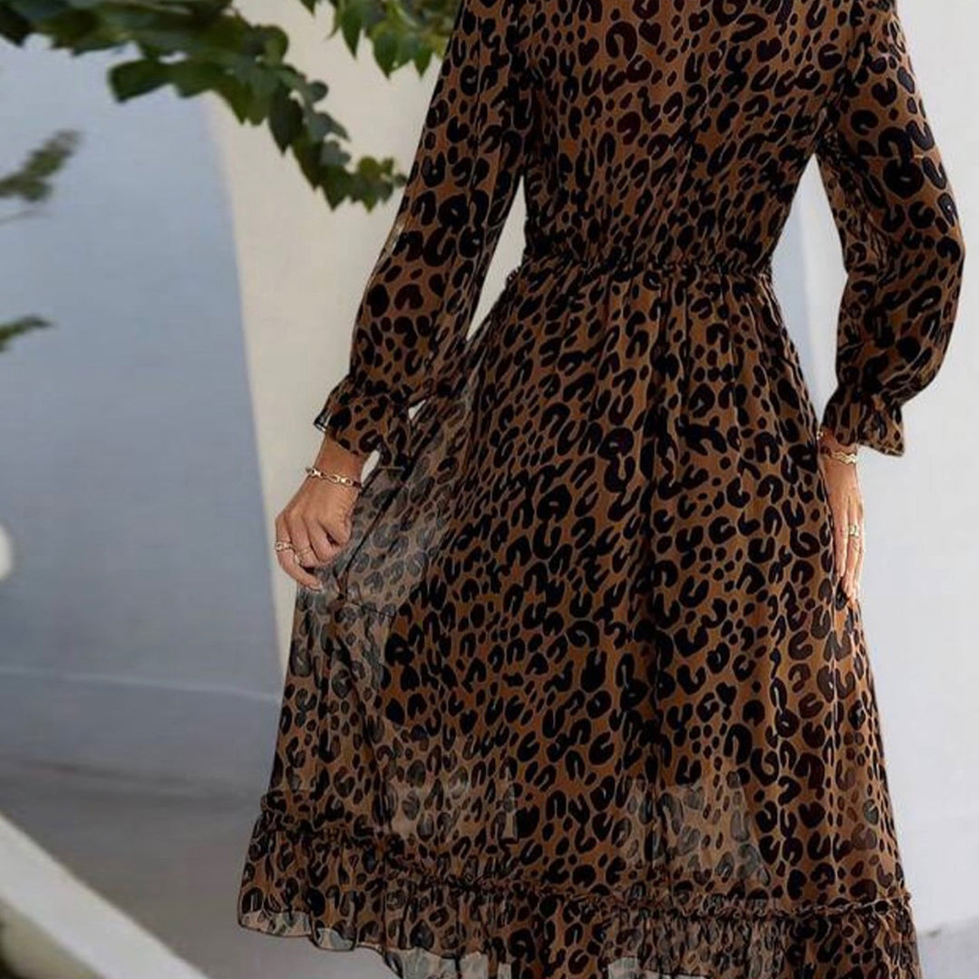 Dame maxi kjole med elegant leopardmønster og voluminøse ermer