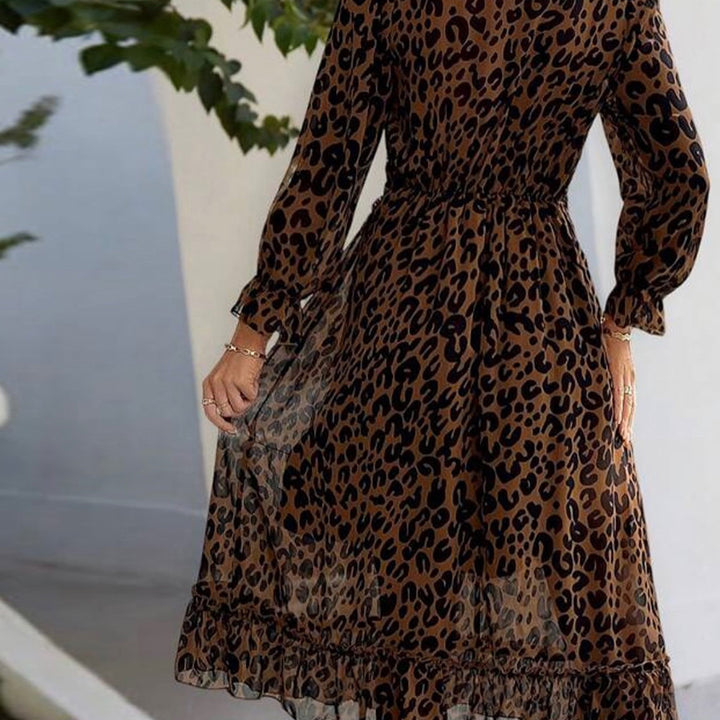 Dame maxi kjole med elegant leopardmønster og voluminøse ermer
