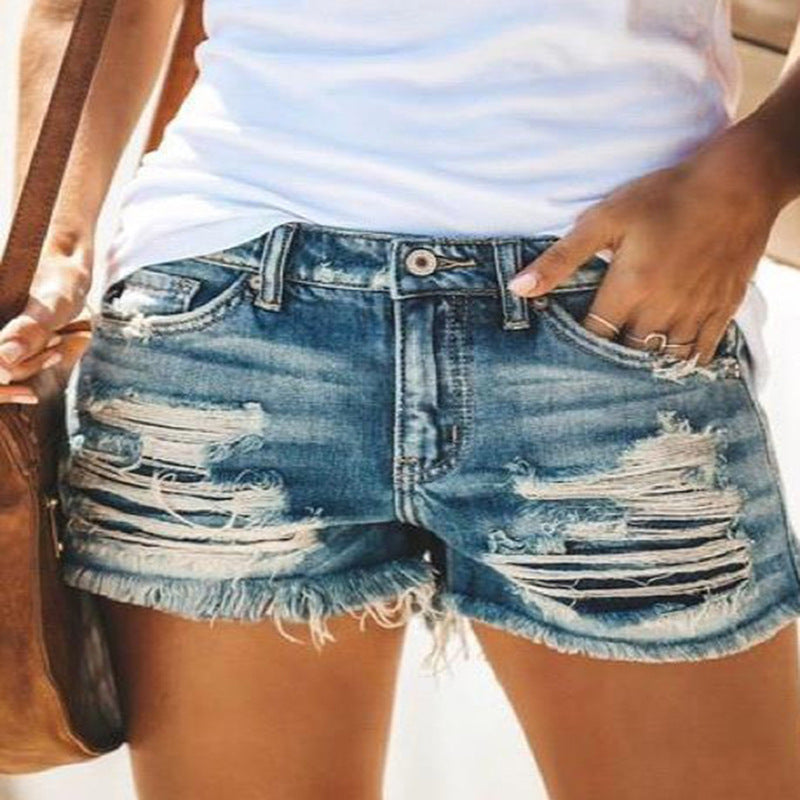 Dame trendy Ødelagte Denim-Shorts med frynsete kanter og stilige rifte detaljer Skjora
