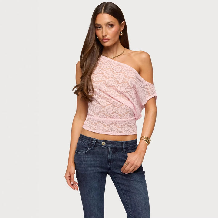 Dame blonderbluse med asymmetrisk design og løs passform Skjora