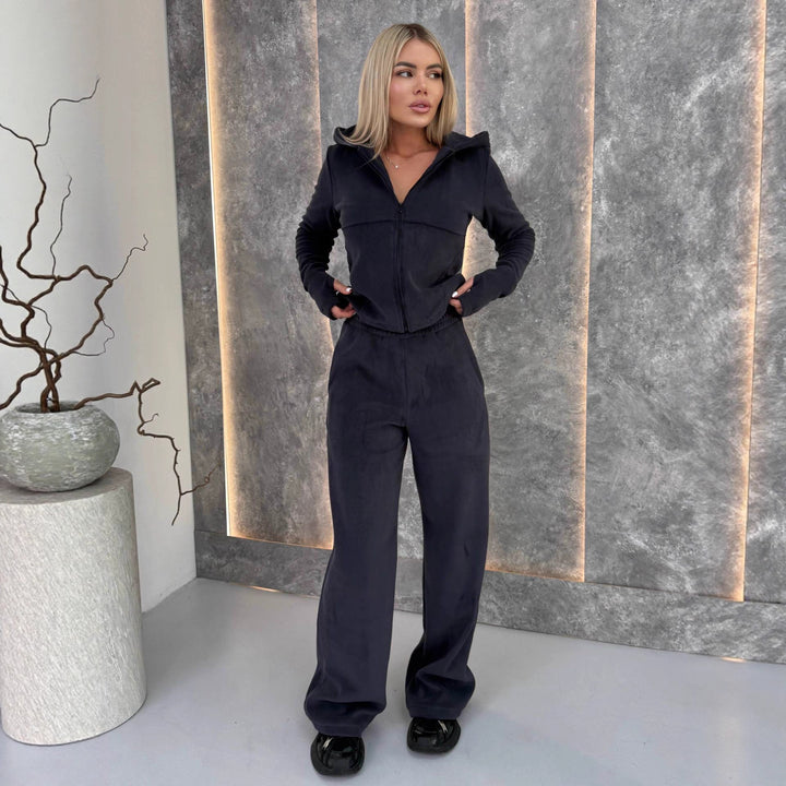 Kvinners fleece jumpsuit med høy krage og praktiske lommer