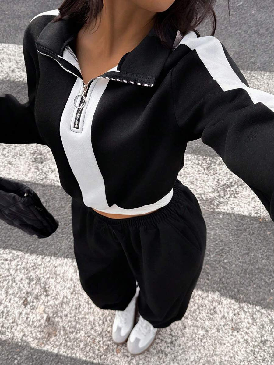 Dame sporty loungewear-set med halv glidelås og elegante kontraststriper Skjora