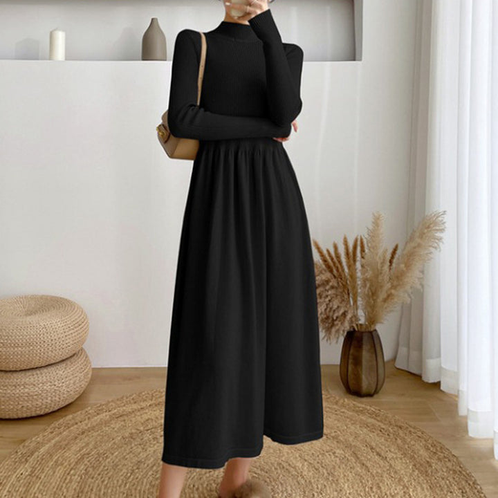 Kvinnens elegante midi kjole med elastisk midjebånd og lange ermer Skjora