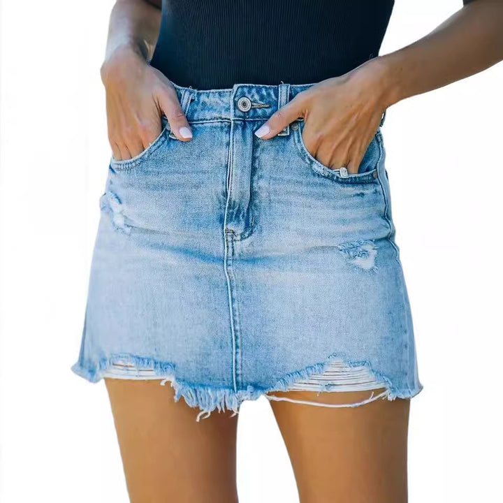Kvinnens denimskjørt i en avslappet brukt look med frynset hem Skjora