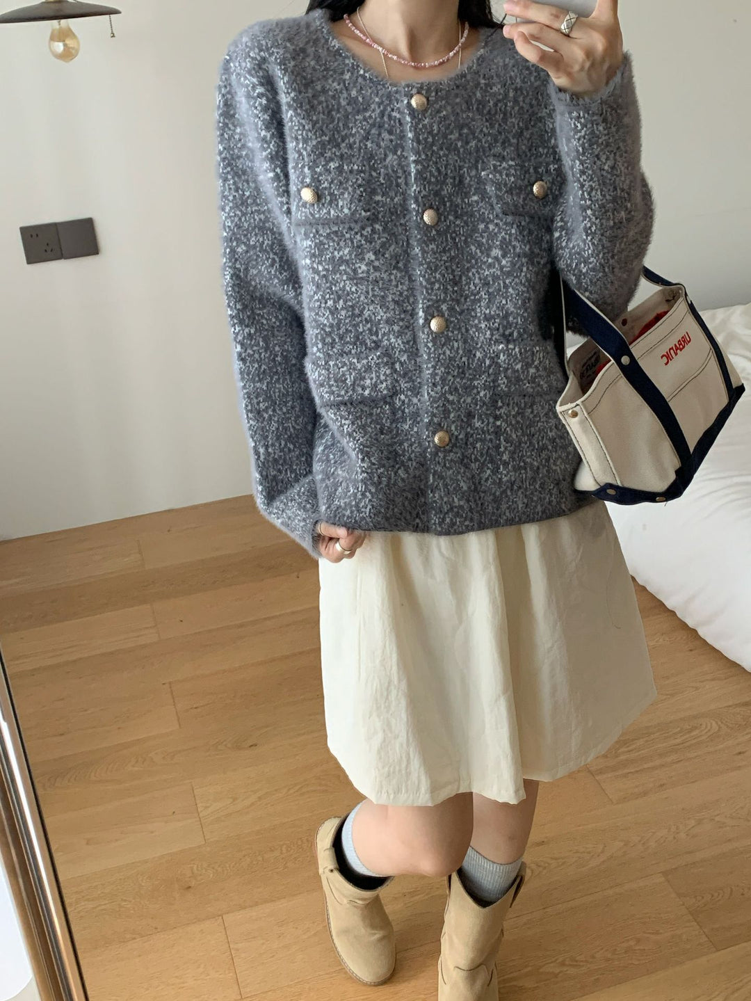 Kvinners koselige cardigan med knappe detaljer og lommeputer Skjora