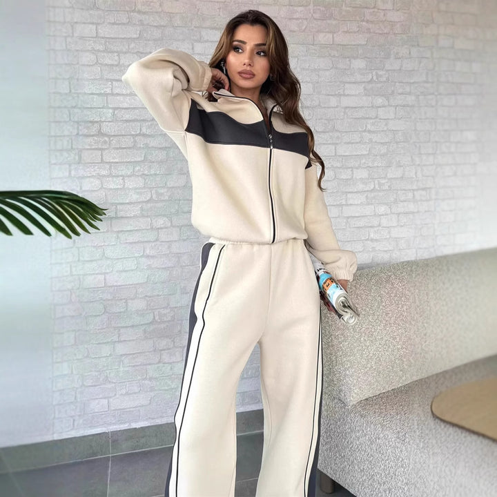 Kvinnelig sporty fleece treningsdrakt med hel glidelås og elastiske mansjetter Skjora