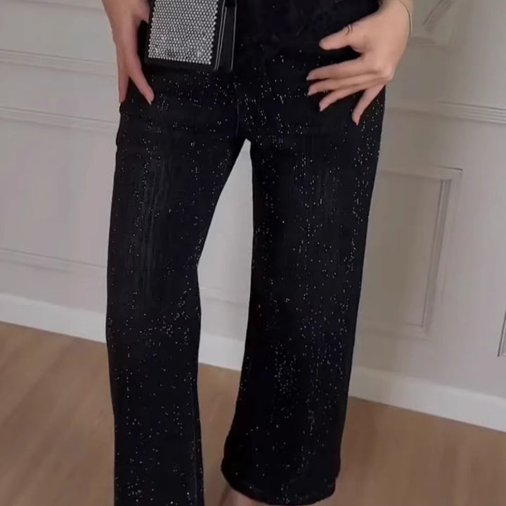 Kvinnelig glitrende vid-cut jeans med elegant tekstur Skjora