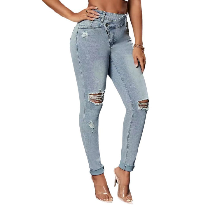 Dame Slim Fit Jeans i moderne brukt utseende med trendy slitasje Skjora
