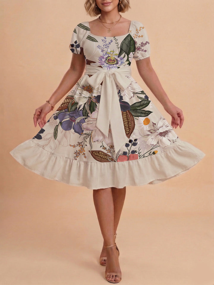 Damen Sommerliches Blumenkleid mit taillierbarem Gürtel und voluminösen Ärmeln Skjora