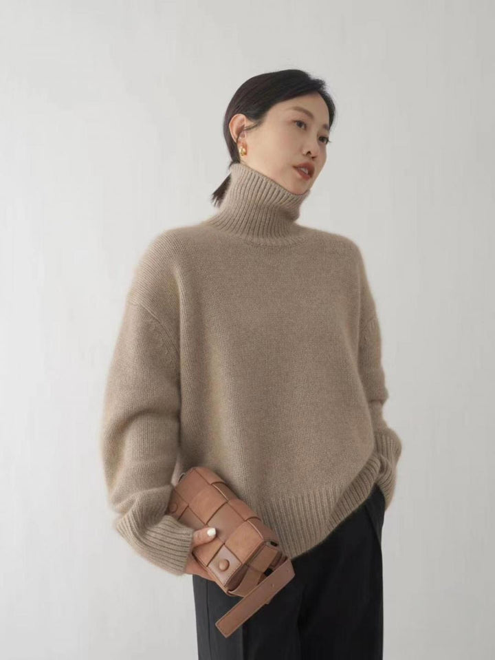 Dame designer turtleneck genser laget av høykvalitets ull Skjora