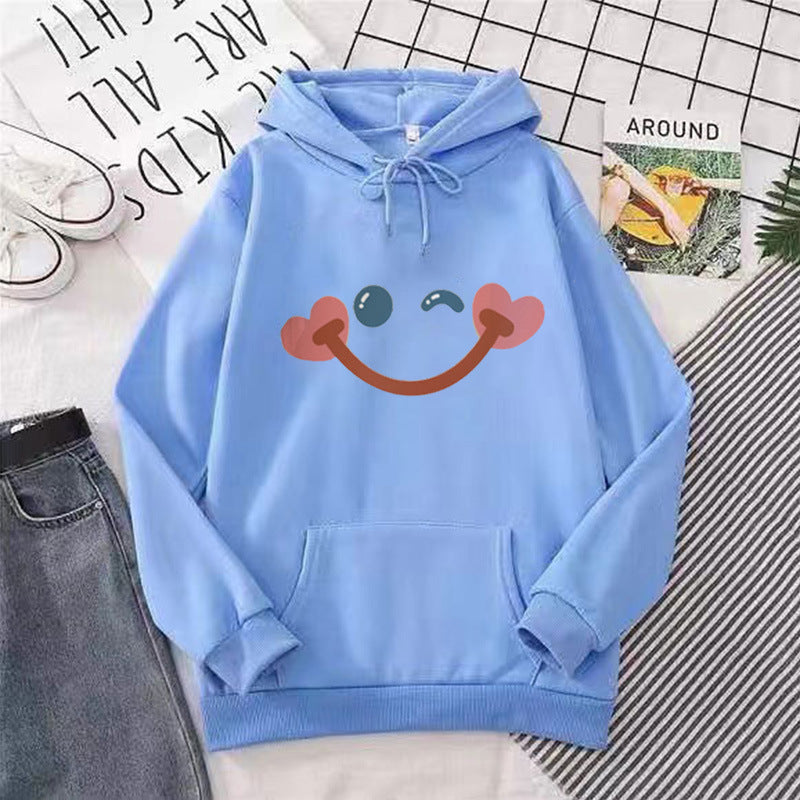 Dame hettegenser med glad smiley-design Skjora