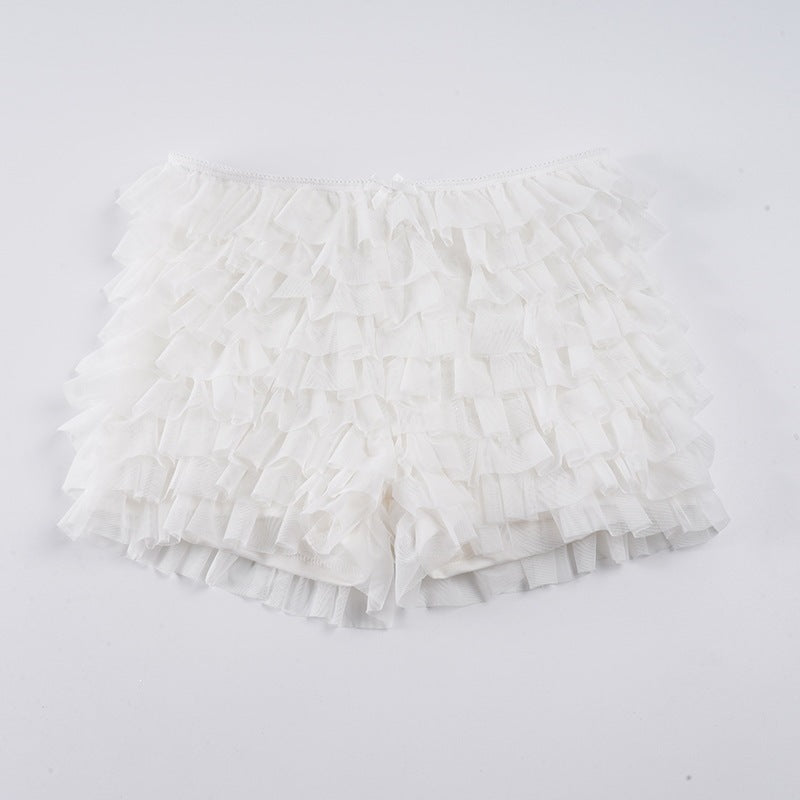 Dame volangshorts med elastisk belte og lekent design Skjora