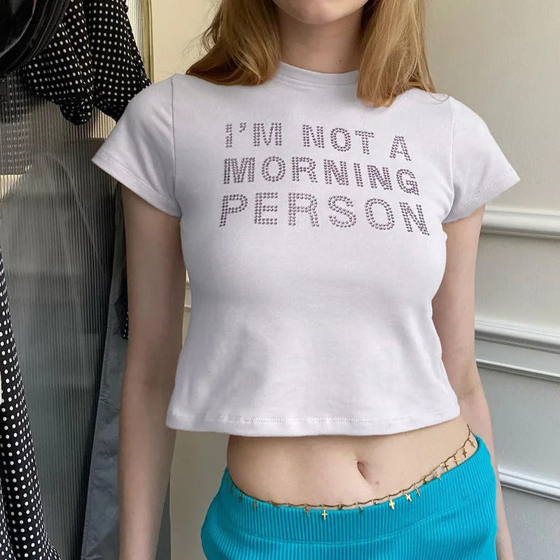 Dame casual cropped T-skjorte med glitter-tekst Skjora