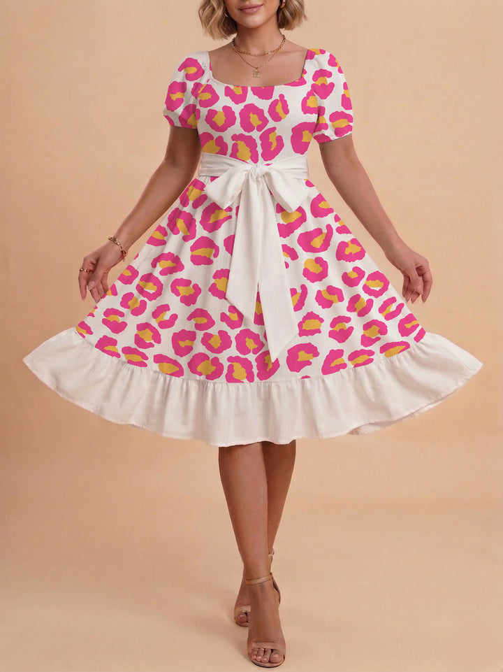 Damen Sommerliches Blumenkleid mit taillierbarem Gürtel und voluminösen Ärmeln Skjora