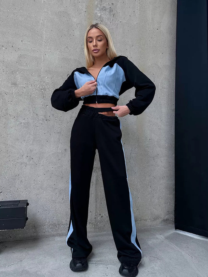 Damer sporty loungewear-set laget av mykt materiale med kengurulomme Skjora