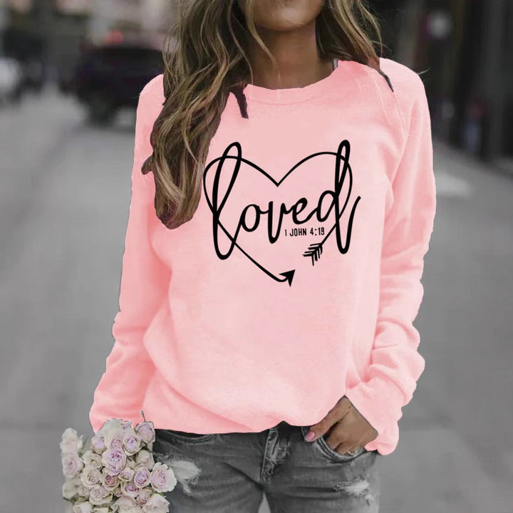 Kvinnelig sweatshirt med hjerteformet trykk og inspirerende budskap Skjora
