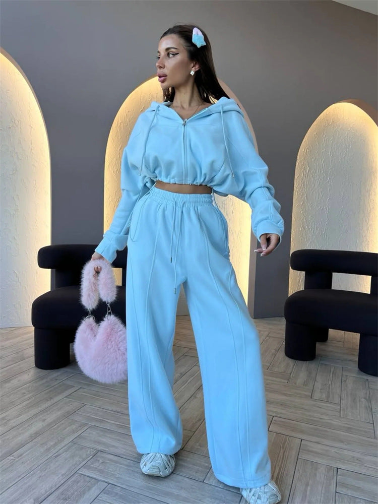 Kvinnors sportiga crop top och lösa joggingsbyxor set Skjora