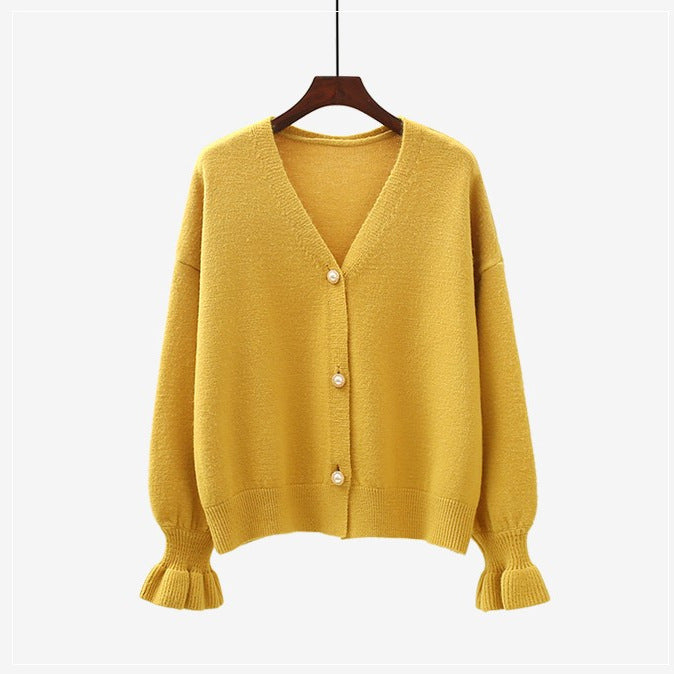 Dame cardigan med perleknapper og løs passform Skjora