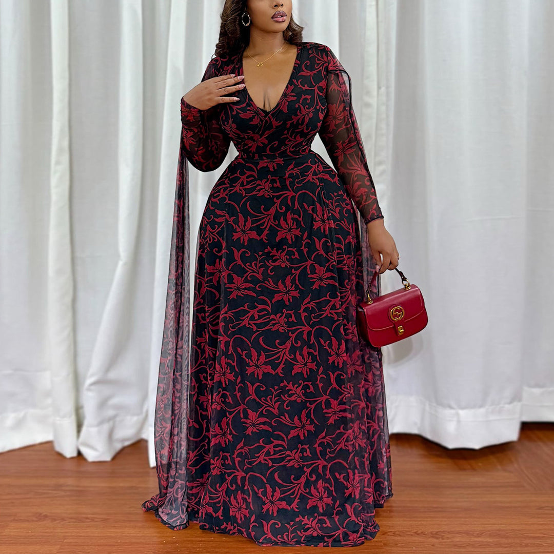 Kvinne maxi kjole med blomstrende transparent design og elegante ermer Skjora