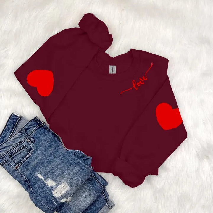 Dame sweatshirt med hjerte design og avslappet passform Skjora
