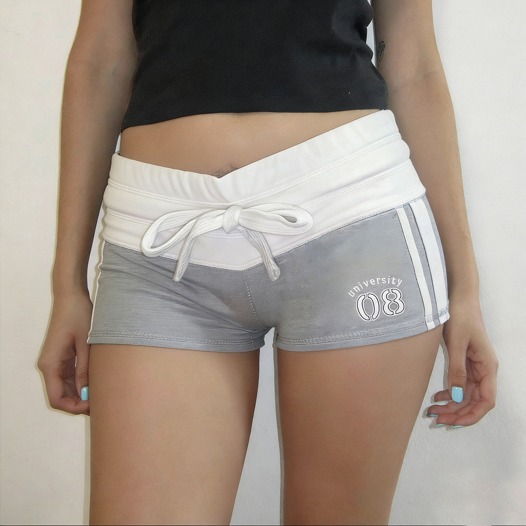 Dame fritidshorts med elastisk midje og dekorativt belte Skjora