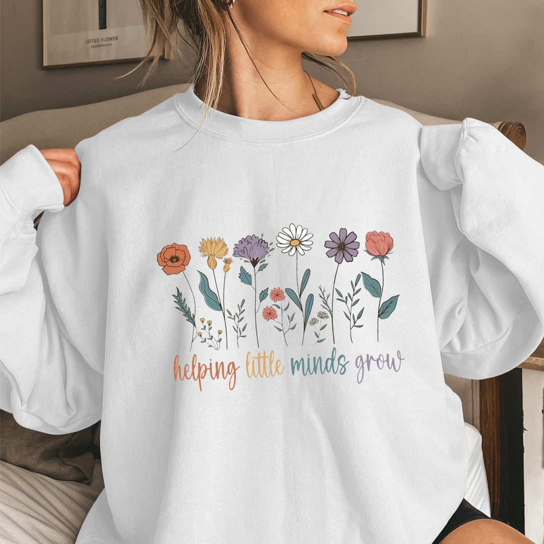 Kvinnesweatshirt med voluminøse ermer og motiverende blomstertrykk Skjora