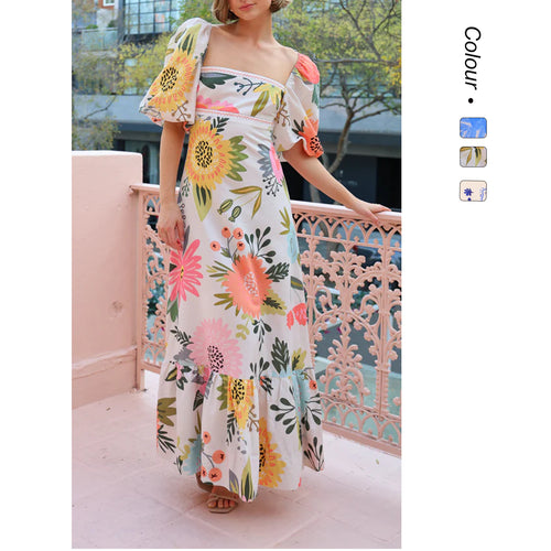 Dame maxi kjole med elegante pufferm og blomsterdetaljer Skjora