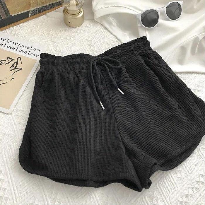 Kvinnelige casual shorts med vaffelstruktur og justerbar snorlås og elastisk midjebånd