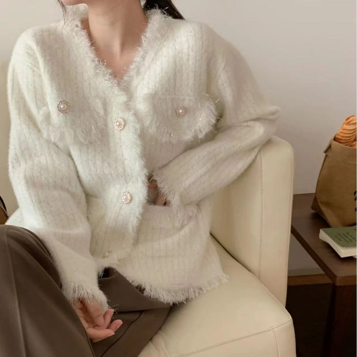 Kvinne cardigan med dekorative perler og frynsete detaljer Skjora