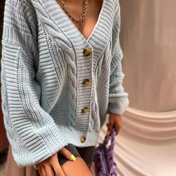 Dame cardigan med dyp V-hals og store knapper Skjora