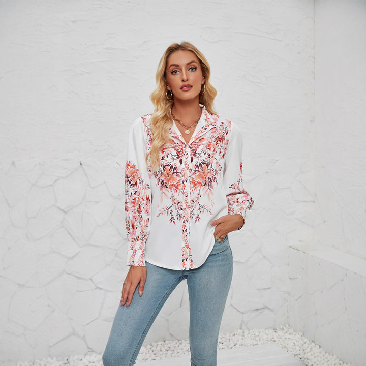 Kvinnenes elegante bluse med blomstermønster og voluminøse ermer