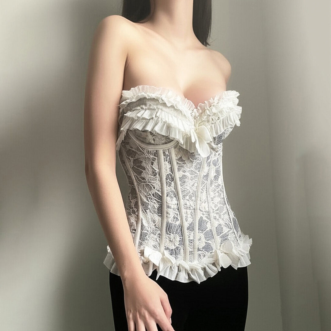 Dame spiss-bustier med volangdetaljer og sløyfer Skjora