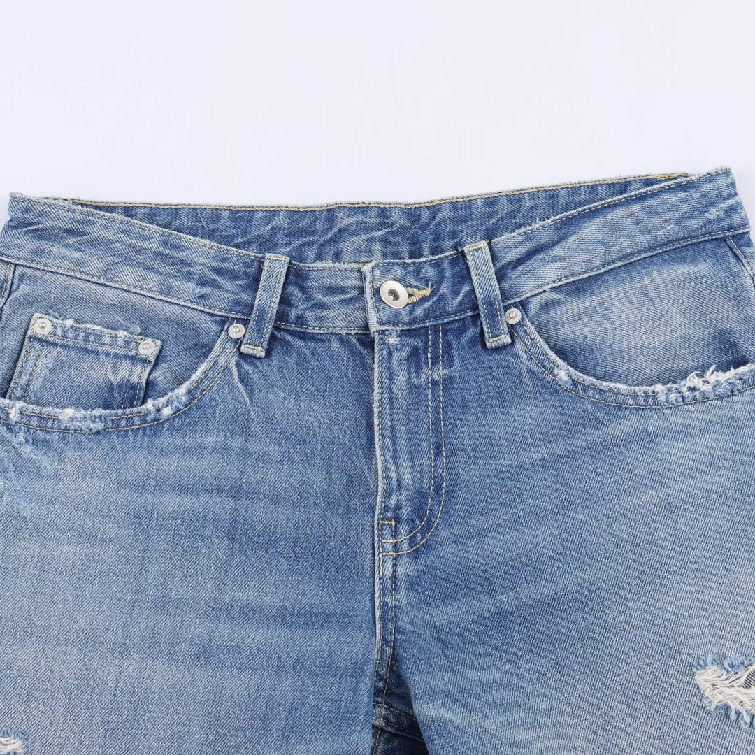 Dame Flared Jeans med ødelagte effekter og frynseavslutninger Skjora