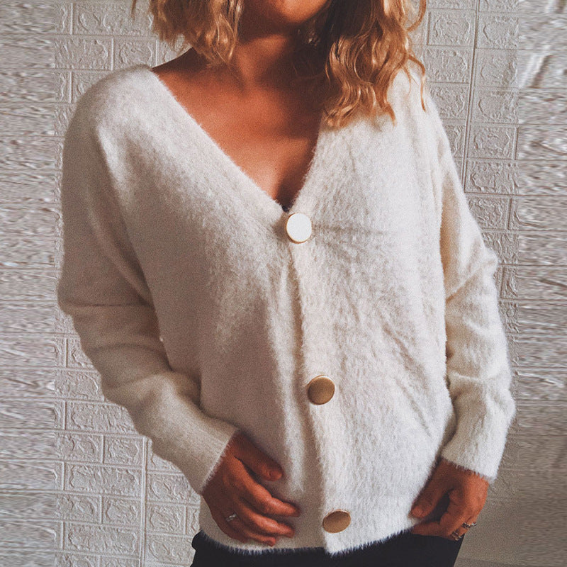 Kvinnens koselige cardigan med store knapper og oversized passform Skjora