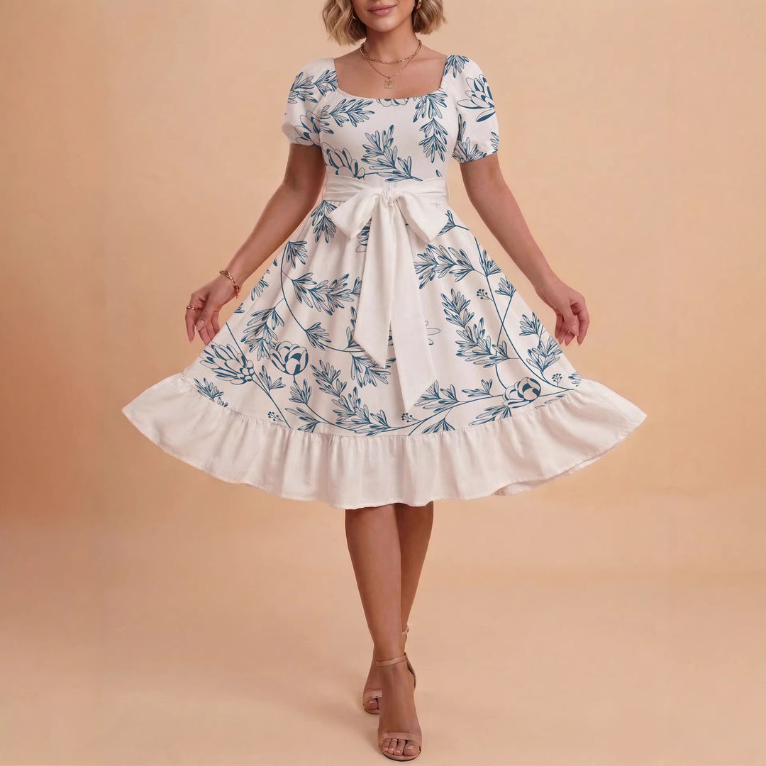 Dame Midi kjole med elegant blomstertrykk og belte i midjen Skjora