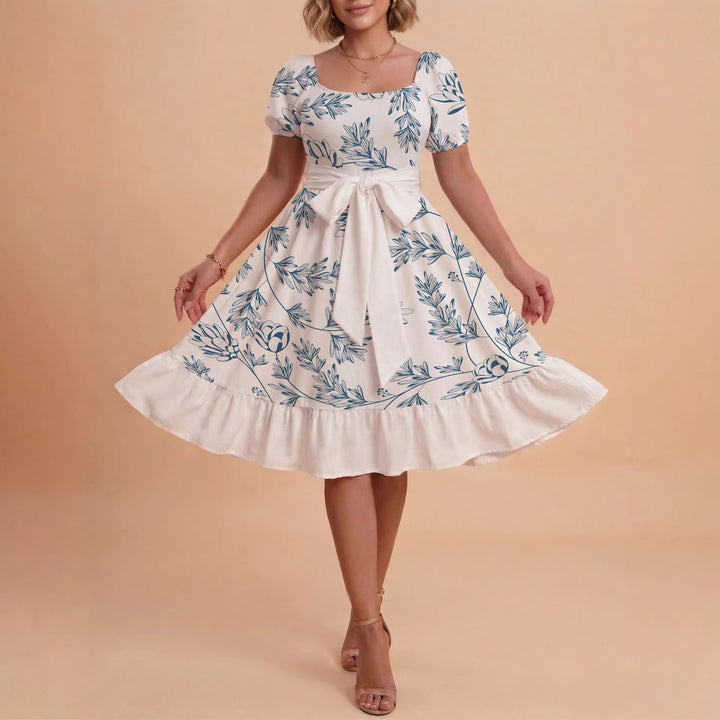 Dame Midi kjole med elegant blomstertrykk og belte i midjen Skjora