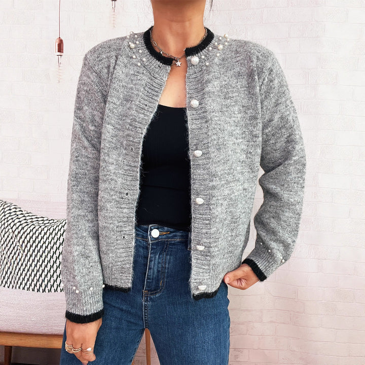 Dame elegant cardigan med dekorative knappe detaljer og perle utsmykkinger Skjora