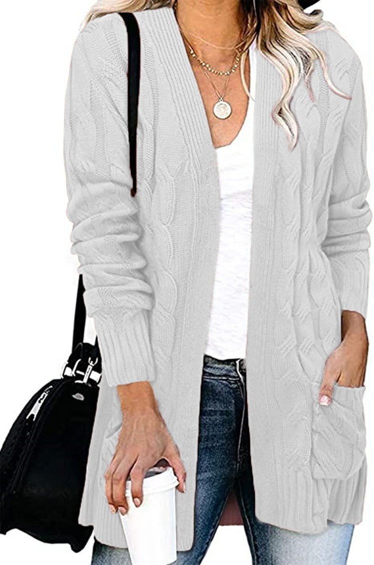 Dame cardigan i elegant flettemønster med åpne lommer Skjora