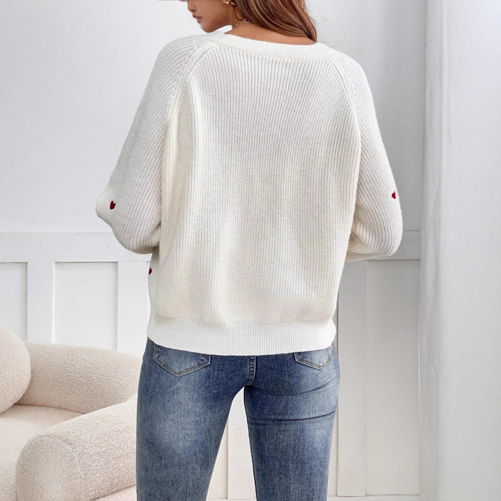 Dame cardigan med hjerteapplikasjoner og knappelukking Skjora