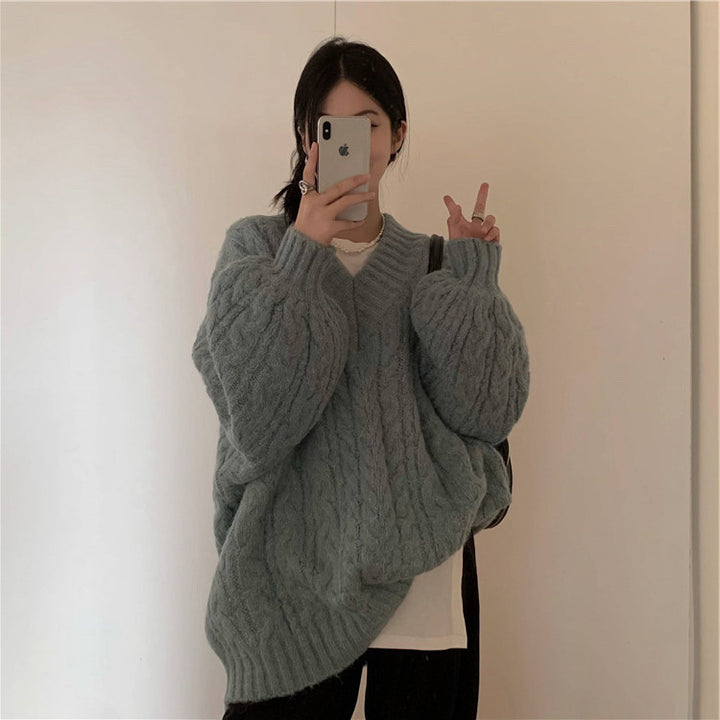Damer strikket genser med teksturert kabelmønster og voluminøse ermer Skjora