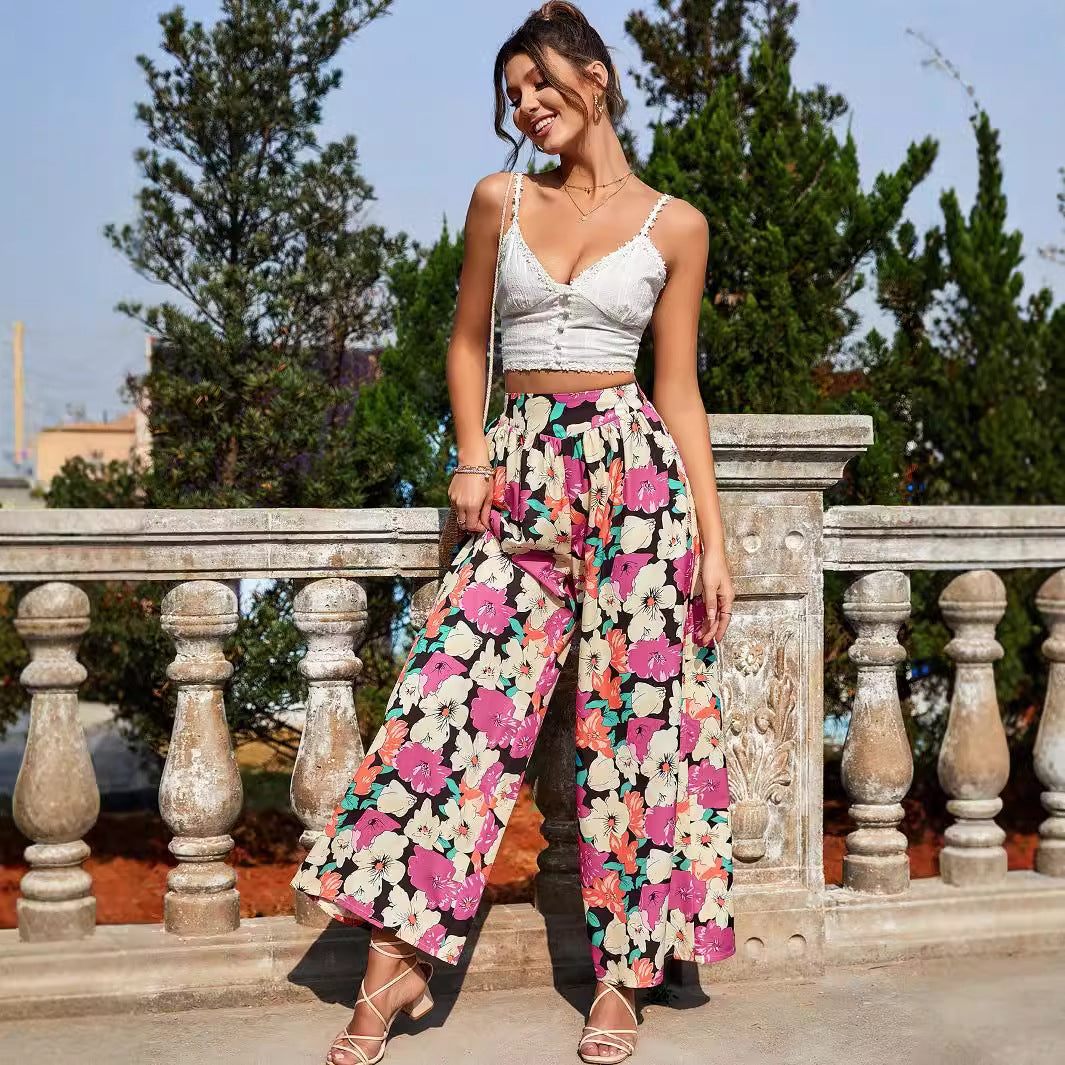 Dame luftig palazzo bukser med fargerik blomsterdesign og elastisk liv Kant Skjora