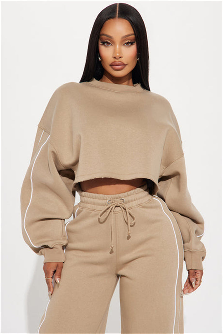 Kvinnesporty cropped sweatshirt og joggedress-sett med praktiske lommer og løs passform Skjora