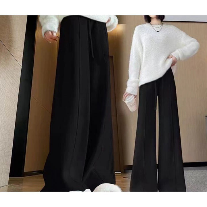 Dame oversized strikkegenser med bred stripet mønster og avslappet passform Skjora